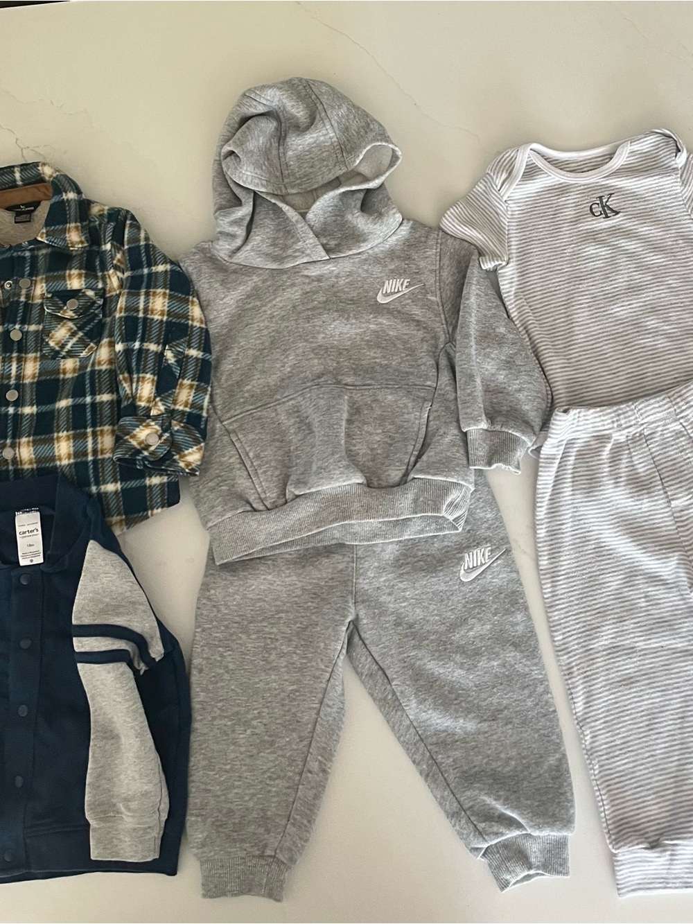 18 M boys cloths.  Eddie Bauer, Nike, Calvin Klein and Carters
